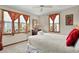 Inviting bedroom featuring cozy decor, warm lighting, and tranquil views at 1615 E Ashley Ave, Folly Beach, SC 29439