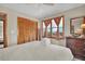 Bedroom with a scenic view, closet, dresser and bright natural light at 1615 E Ashley Ave, Folly Beach, SC 29439