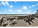 Oceanfront deck featuring comfortable seating, ideal for relaxation and enjoying scenic views of the beach at 1615 E Ashley Ave, Folly Beach, SC 29439
