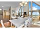 Bright dining area with large windows and a view of the ocean at 1615 E Ashley Ave, Folly Beach, SC 29439