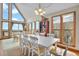 Bright dining area with large windows and ocean views at 1615 E Ashley Ave, Folly Beach, SC 29439