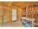 Unfinished garage area with door leading to the outside and room for storage at 1615 E Ashley Ave, Folly Beach, SC 29439