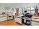 Kitchen features stainless steel appliances and hardwood floors at 1615 E Ashley Ave, Folly Beach, SC 29439