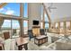 Bright and airy living room with large windows and stunning ocean views at 1615 E Ashley Ave, Folly Beach, SC 29439