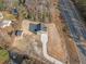 A lovely aerial view of the entire property from above showing driveway, home, and outbuilding at 1738 N N Hwy 52, Bonneau, SC 29431
