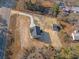 A great aerial view of the entire home, outbuilding, and surrounding acreage at 1738 N N Hwy 52, Bonneau, SC 29431