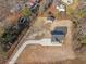 An overhead view shows the perimeter of the lot, the house, and the outbuilding at 1738 N N Hwy 52, Bonneau, SC 29431