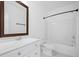 Bathroom features a large mirror over the sink and a shower tub with black fixtures at 1738 N N Hwy 52, Bonneau, SC 29431