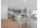 Open concept kitchen with stainless steel appliances and an adjacent dining area for Gathering meals at 1738 N N Hwy 52, Bonneau, SC 29431