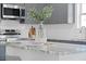 Close-up of the kitchen island, displaying granite countertops and modern finishes and decorative pieces at 1738 N N Hwy 52, Bonneau, SC 29431