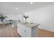 Bright kitchen featuring a center island, stainless steel appliances, and ample counter space, ideal for cooking at 1738 N N Hwy 52, Bonneau, SC 29431