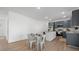 Spacious kitchen and dining area with stainless steel appliances and modern gray cabinetry at 1738 N N Hwy 52, Bonneau, SC 29431