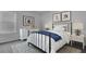 Cozy bedroom with nautical themed decor, soft lighting, and a comfortable bed at 187 Belfort Place, Summerville, SC 29486