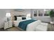 Comfortable bedroom features plush carpeting, a large window, and stylish decor at 187 Belfort Place, Summerville, SC 29486