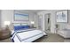 Serene bedroom with a plush bed, elegant artwork, and access to an ensuite bathroom at 187 Belfort Place, Summerville, SC 29486