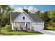 Charming single-Gathering home features a two-car garage, covered front porch, and classic architectural design at 187 Belfort Place, Summerville, SC 29486