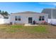 Fenced backyard featuring a well-maintained lawn and a patio area, perfect for Gathering gatherings at 202 Tall Grass Ct, Summerville, SC 29483