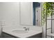 Bright bathroom features a modern sink, a mirror and door leading to another room at 202 Tall Grass Ct, Summerville, SC 29483