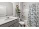 Bathroom with a tub-shower combo and neutral tiling at 202 Tall Grass Ct, Summerville, SC 29483