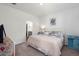 Comfortable bedroom with plush carpet, a neutral color scheme, and access to an ensuite bathroom at 202 Tall Grass Ct, Summerville, SC 29483