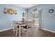 Cozy dining area with natural light and access to the backyard at 202 Tall Grass Ct, Summerville, SC 29483