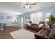 Living room featuring wood floors, an open floorplan, and a dining area at 202 Tall Grass Ct, Summerville, SC 29483