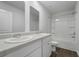 Well-lit bathroom with double sinks, modern fixtures, and a shower-tub combination for convenience at 204 Cozy Brook Ct, Summerville, SC 29486