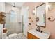 Modern bathroom featuring a glass enclosed shower, marble countertop, and stylish fixtures at 2166 Welch Ave, Charleston, SC 29412