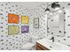 Modern bathroom with stylish wallpaper, contemporary fixtures, and an artistic flair at 2166 Welch Ave, Charleston, SC 29412