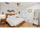 Inviting bedroom featuring a wooden bed frame, matching nightstands, decor, and ample natural light at 2166 Welch Ave, Charleston, SC 29412