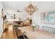Spacious, light-filled dining area adjacent to the living room and kitchen at 2166 Welch Ave, Charleston, SC 29412