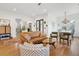 Open-concept living space with hardwood floors and a comfortable seating arrangement at 2166 Welch Ave, Charleston, SC 29412