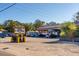 Active location showcasing vehicles in the parking lot, a vibrant sign, and landscaping at 2166 Welch Ave, Charleston, SC 29412