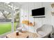 Cozy porch area with comfortable seating, a TV, and an outdoor view at 2166 Welch Ave, Charleston, SC 29412