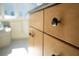Detailed shot of cabinet doors with unique stone pulls, adding character to the kitchen or bathroom at 2276 Seascape Ct, Seabrook Island, SC 29455