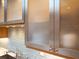 Sleek kitchen cabinets with stainless steel trim and updated hardware at 2276 Seascape Ct, Seabrook Island, SC 29455