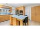 Kitchen featuring a large island with seating, stainless appliances, and ample counter space at 2276 Seascape Ct, Seabrook Island, SC 29455