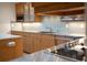 Modern kitchen featuring sleek countertops, stainless steel appliances, and custom cabinets at 2276 Seascape Ct, Seabrook Island, SC 29455