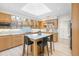 Bright kitchen with stainless steel appliances, a central island, and stylish modern fixtures at 2276 Seascape Ct, Seabrook Island, SC 29455