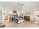 Spacious main bedroom with a large bed, tasteful decor, and access to an ensuite bathroom at 2276 Seascape Ct, Seabrook Island, SC 29455