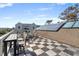 Rooftop deck offering outdoor seating and solar panels with neighborhood views at 2276 Seascape Ct, Seabrook Island, SC 29455