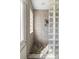 Shower features glass block accents, built-in shelving, and a window at 2276 Seascape Ct, Seabrook Island, SC 29455