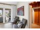 Bedroom sitting area with natural light streaming in, overlooking the porch at 2276 Seascape Ct, Seabrook Island, SC 29455