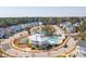 A picturesque aerial view showcasing the community's pool, clubhouse, and scenic water feature at 2514 Bullock Guard Dr, Johns Island, SC 29455