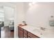 Bathroom vanity features granite countertops, wooden cabinets, and modern sink fixture at 2514 Bullock Guard Dr, Johns Island, SC 29455