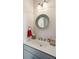 Charming powder room with a round mirror and ample counter space at 2514 Bullock Guard Dr, Johns Island, SC 29455