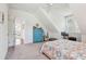 Bright bedroom features furniture and decor on top of light carpet with windows at 2514 Bullock Guard Dr, Johns Island, SC 29455