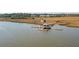 Scenic dock with a covered area extending into the water, ideal for boating and relaxing at 2514 Bullock Guard Dr, Johns Island, SC 29455