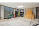 Bright garage space with large louvered windows, a workbench, and ample storage at 2514 Bullock Guard Dr, Johns Island, SC 29455