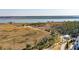 Marsh view featuring a boardwalk and dock, showcasing the community's serene natural surroundings at 2514 Bullock Guard Dr, Johns Island, SC 29455